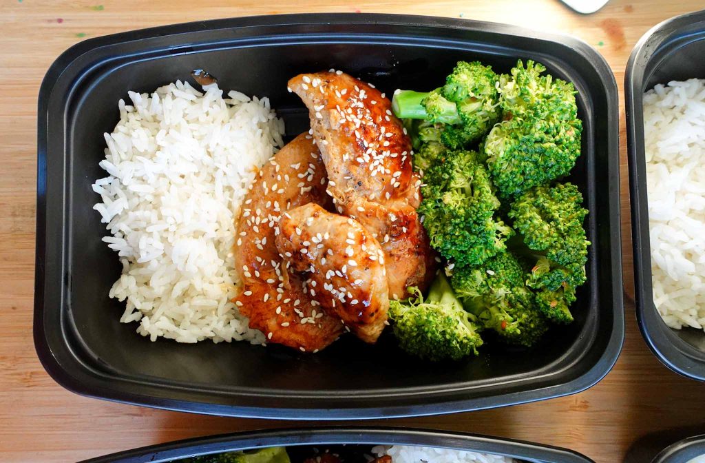 Teriyaki Chicken in meal prep container with broccoli and rice